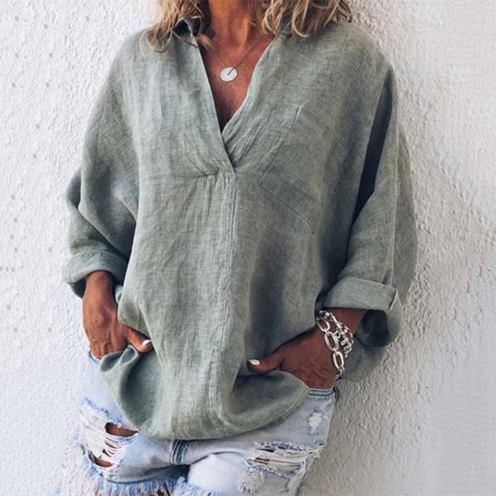 Grijze linnen blouse voor dames, casual oversized pasvorm, lange mouwen, V-hals, ideaal voor lente en zomer. Trendy en comfortabel.
