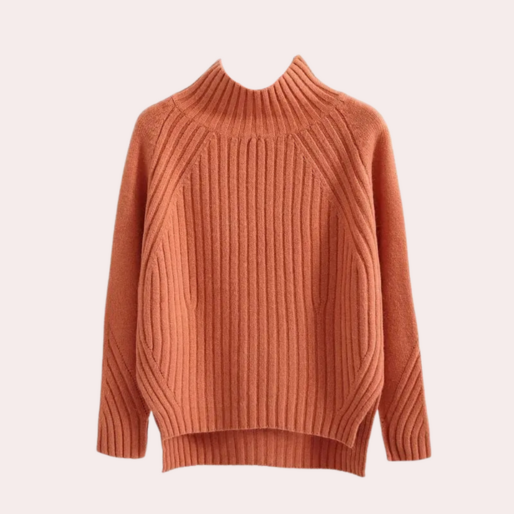 Oranje gebreide trui met hoge kraag, ribbelpatroon en lange mouwen. Modieuze dameskleding, herfst- en wintertrui, warme casual stijl.