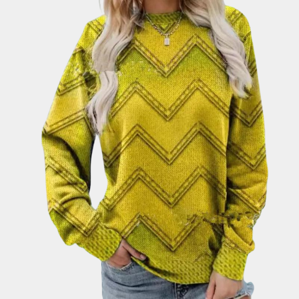 Vrouw in gele trui met zigzagpatroon, lange mouwen, casual stijl, gecombineerd met spijkerbroek. Perfect voor herfstmode en trendy outfits.
