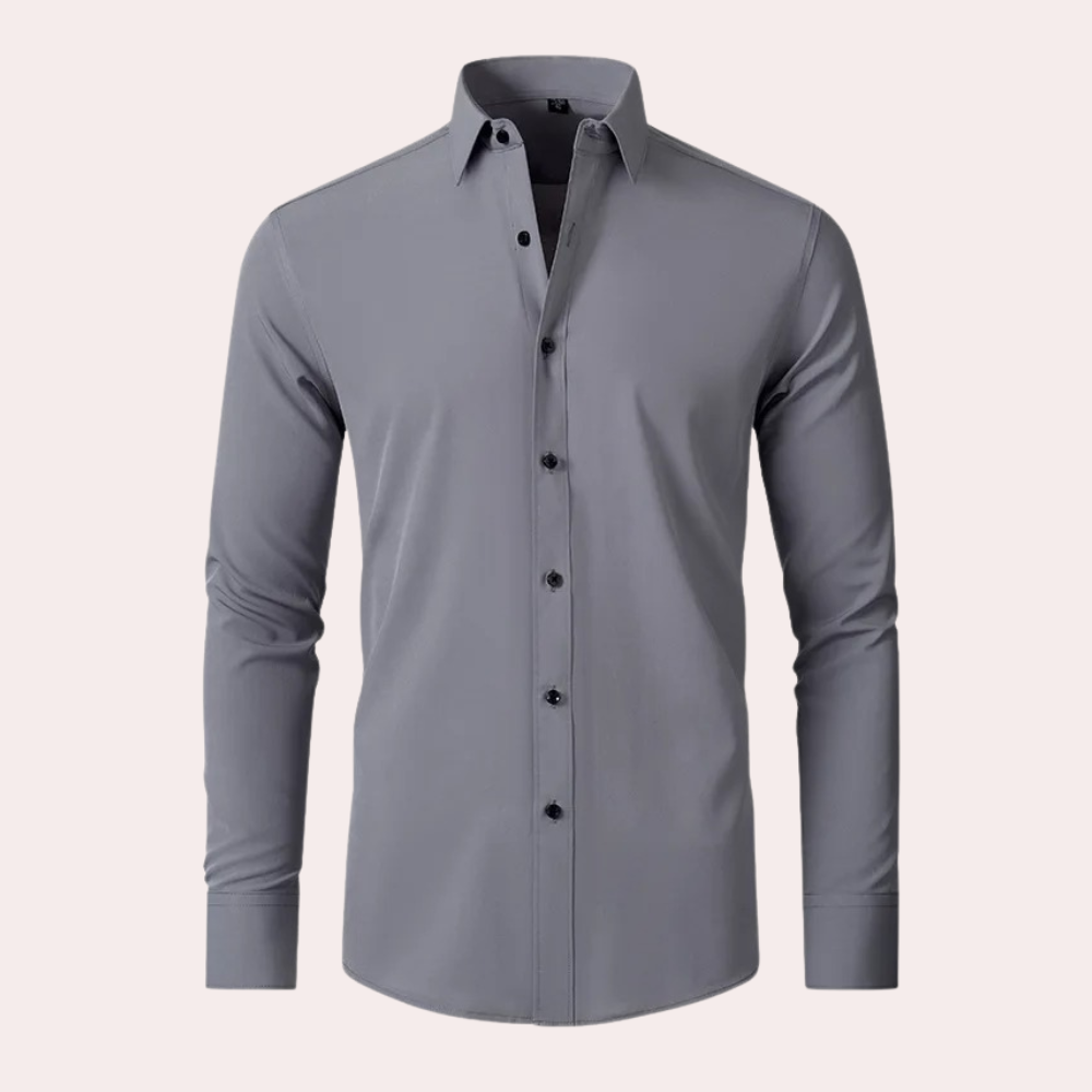 Grijze herenoverhemd met lange mouwen, klassieke kraag en zwarte knopen. Perfect voor zakelijke en casual gelegenheden. Stijlvol en modern design.