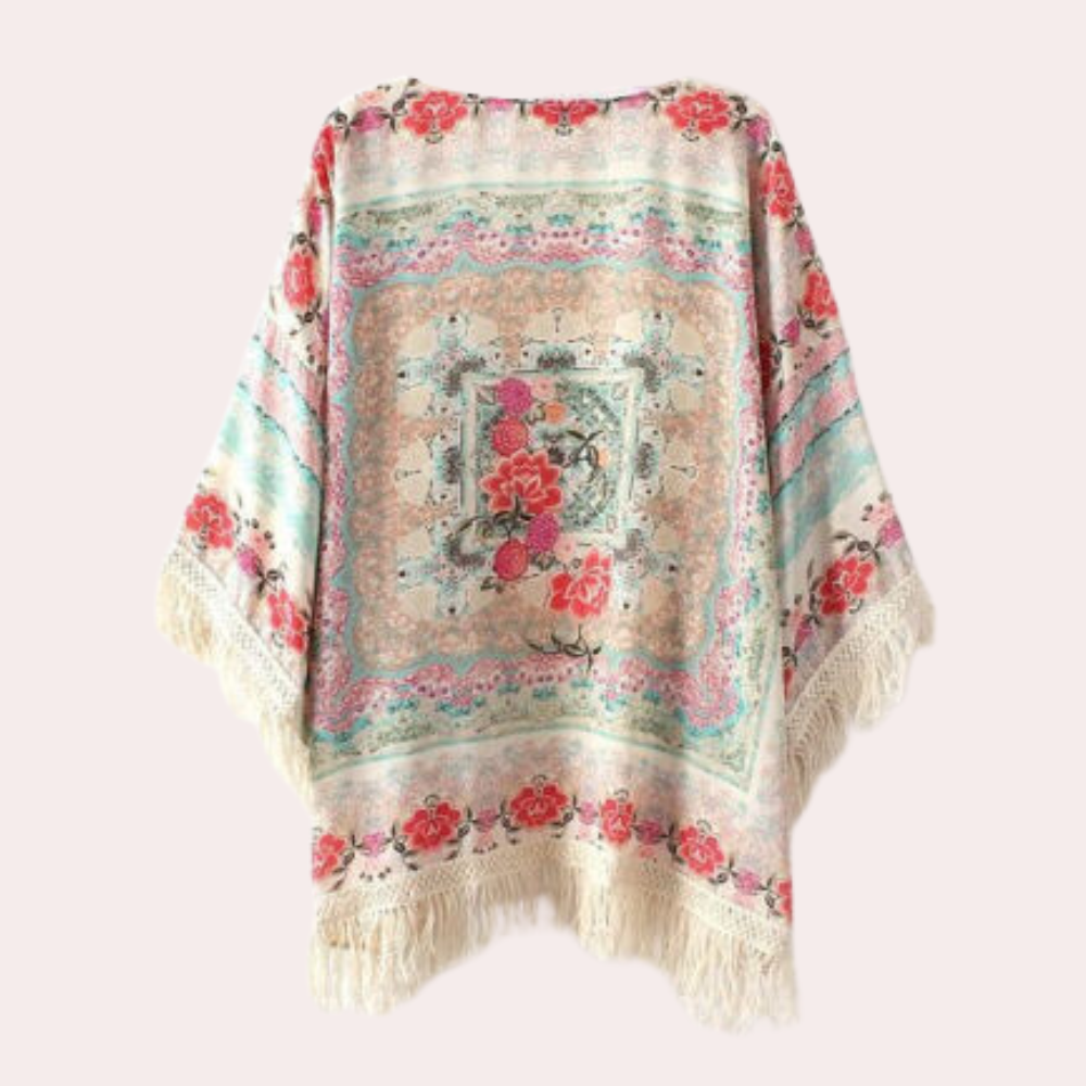 Boho kimono met bloemenprint en franjes, kleurrijk ontwerp, damesmode, vintage stijl, ideaal voor zomeroutfits en festival looks.