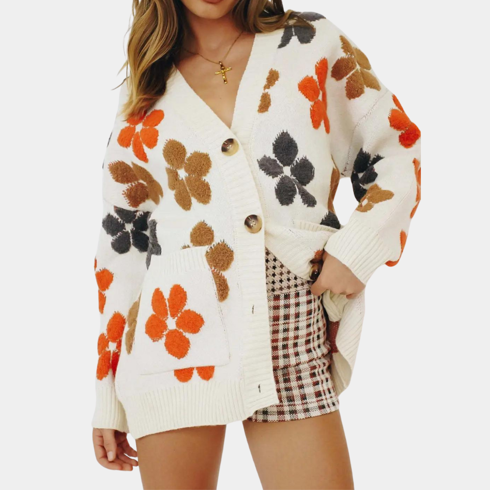 Dames gebreid vest met bloemenpatroon, crèmewit, oranje en bruin, knoopsluiting, zakken, herfstmode, trendy kleding, comfortabele pasvorm.