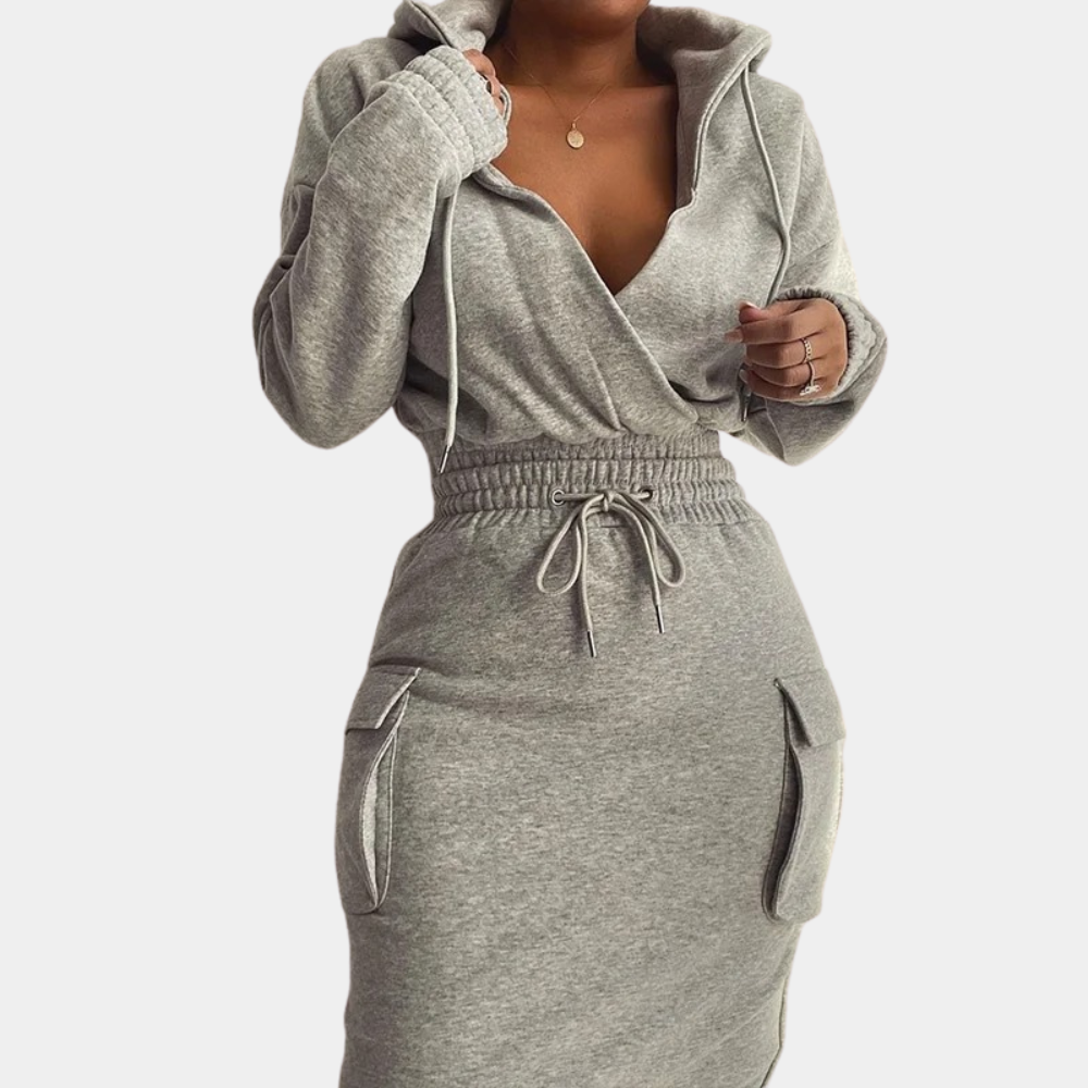 Grijze damesjurk met capuchon, lange mouwen en zakken. Comfortabele, casual stijl. Perfect voor dagelijks gebruik en modieuze outfits.