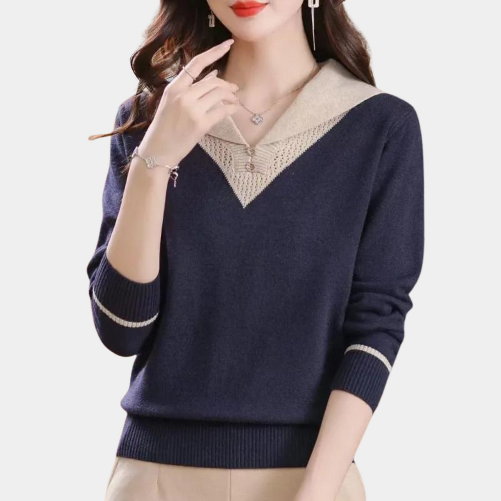 Donkerblauwe damestrui met beige kraag en V-hals, lange mouwen, elegante stijl. Perfect voor herfstmode en casual outfits.