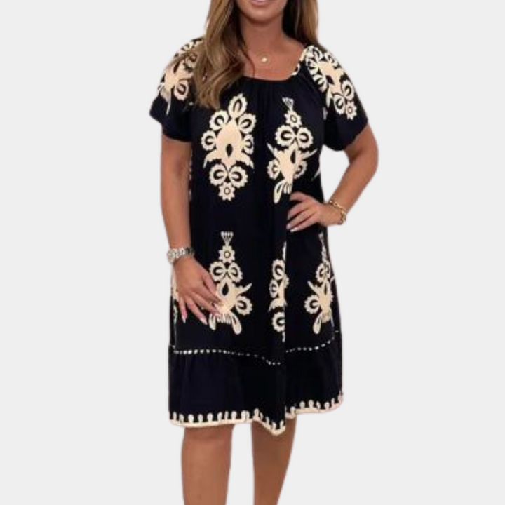 Zwarte jurk met korte mouwen en beige bloemenpatroon, damesmode, casual zomerjurk, boho-stijl, comfortabele pasvorm, trendy kleding.