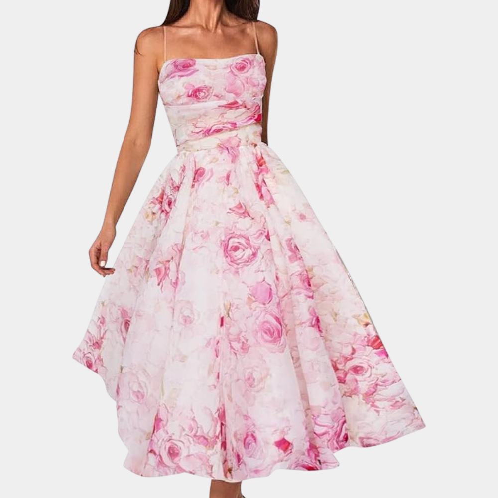 Roze bloemenjurk met spaghettibandjes, elegante A-lijn snit, ideaal voor zomerse gelegenheden. Vrouwelijke mode, trendy design.