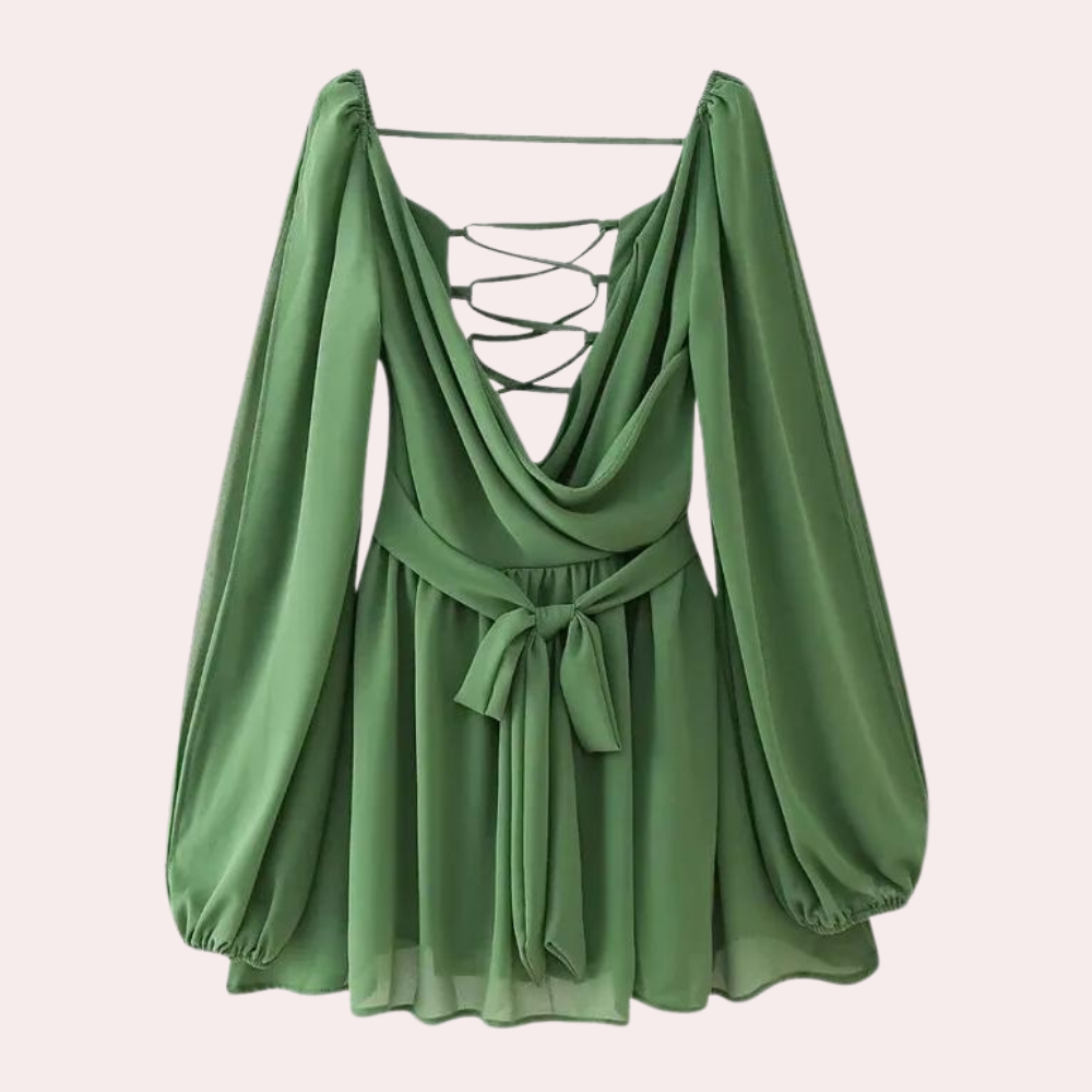 Groene damesjurk met lange mouwen, diepe V-hals en strikdetail. Perfect voor modieuze gelegenheden. Trendy en elegant ontwerp.