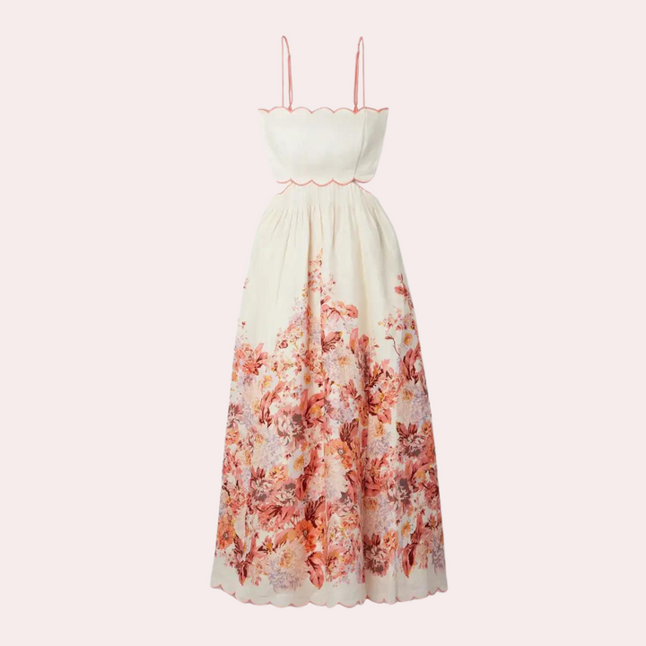 Witte zomerjurk met bloemenprint, spaghetti bandjes en golvende zoom. Perfect voor elegante zomerevenementen. Vrouwelijke mode, trendy jurk.