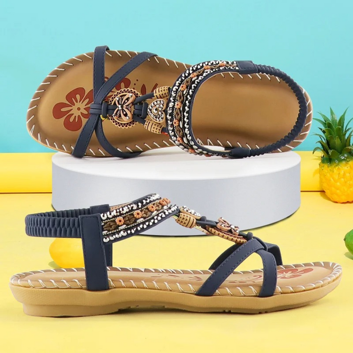 Donkerblauwe dames sandalen met kralen en bloemenpatroon, comfortabele zool, zomerschoeisel, perfect voor casual en strandoutfits.