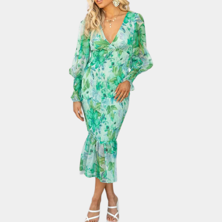 Groene bloemenjurk met lange mouwen en V-hals, elegante midi-lengte, perfect voor lente- en zomermode. Ideaal voor dameskleding en trendy outfits.
