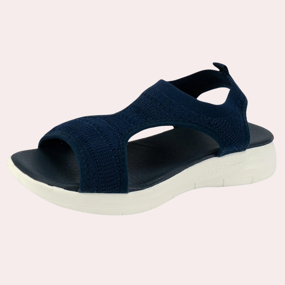 Donkerblauwe dames sandaal met gebreide bovenkant en witte zool, comfortabele zomerschoen, ademend materiaal, ideaal voor casual en dagelijks gebruik.