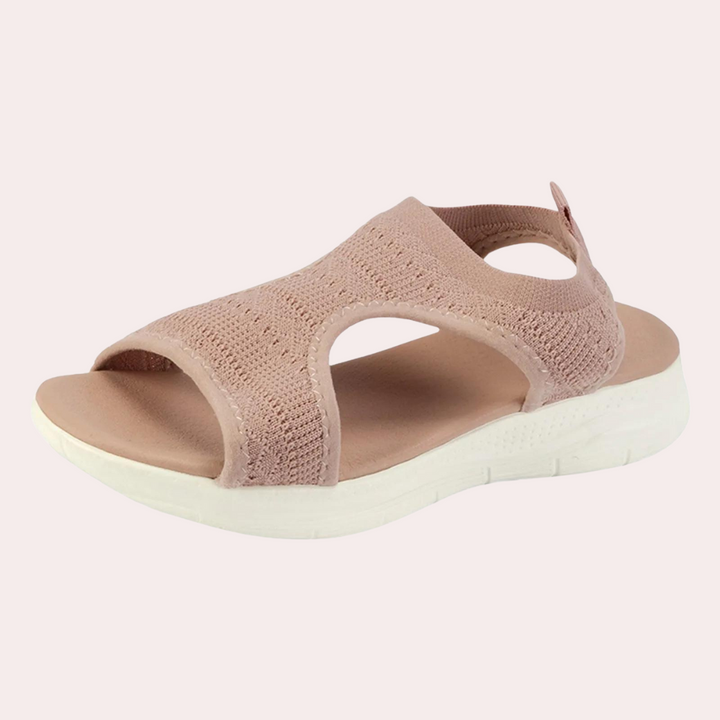 Roze dames sandaal met gebreide bovenkant en witte zool, comfortabele zomerschoen, ideaal voor casual en dagelijks gebruik.