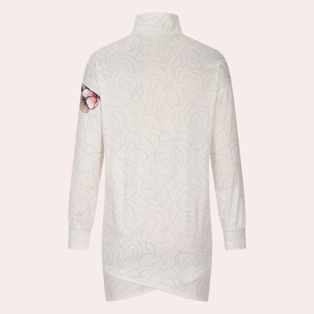 Witte blouse met lange mouwen en subtiel bloemenpatroon, Venetiaanse stijl. Perfect voor modieuze dameskleding, elegant en veelzijdig.