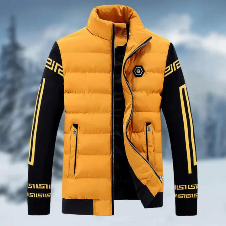 Gele gewatteerde jas met zwarte mouwen en geometrisch patroon, ideaal voor wintermode. Stijlvolle herenjas voor koude weersomstandigheden.