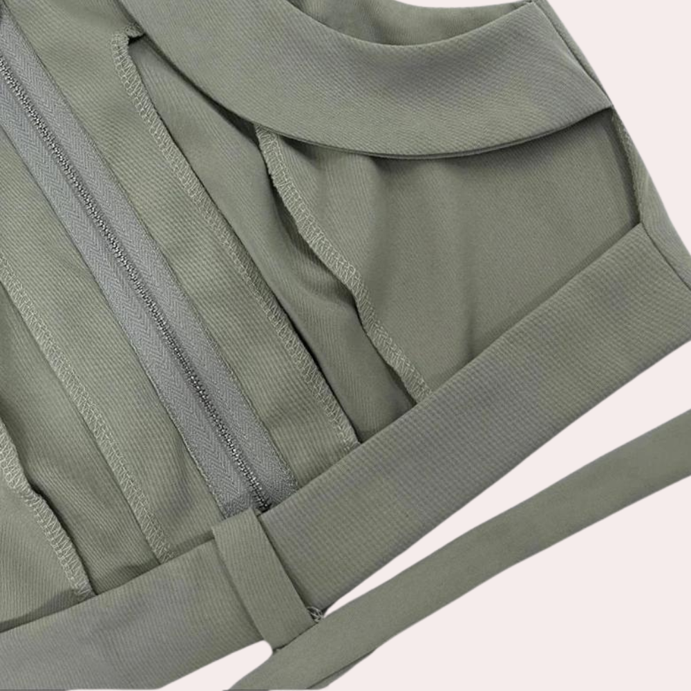 Groene cropped top met ritssluiting, ribstof en brede schouderbanden. Modieuze dameskleding, perfect voor casual en trendy outfits.