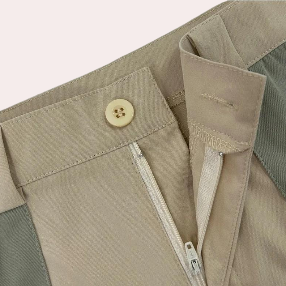 Beige en olijfgroene damesbroek met knoopsluiting en ritssluiting, stijlvolle casual mode, hoogwaardige stof, trendy dameskleding.