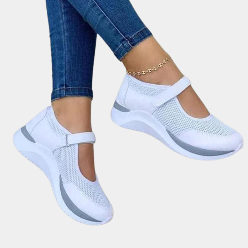 Witte dames sneakers met klittenband, ademend mesh, comfortabele zool. Perfect voor casual en sportieve outfits. Trendy en stijlvol schoeisel.