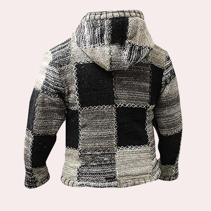 Grijze patchwork hoodie met capuchon, zwart-witte vierkanten, handgemaakt, unisex, warme winterkleding, boho-stijl, duurzame mode.