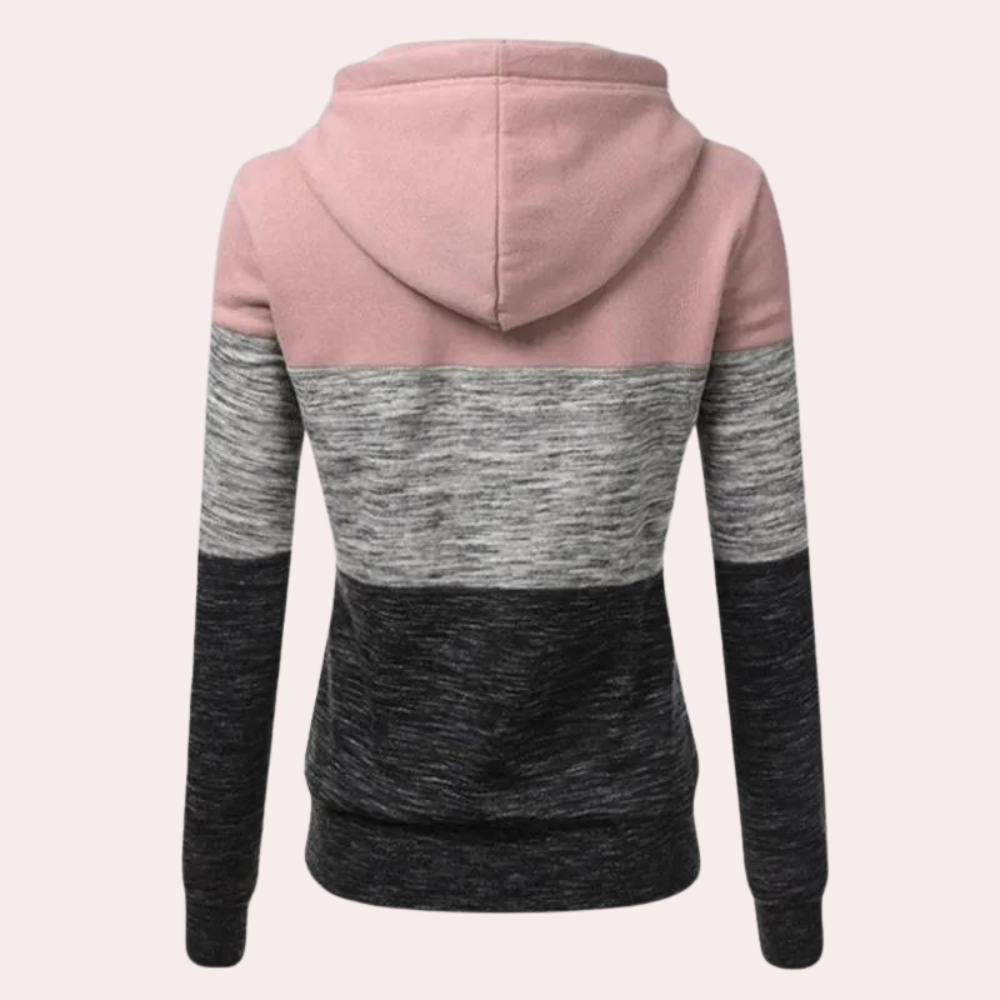 Roze en grijze dameshoodie met capuchon, kleurblokken design, lange mouwen. Comfortabele casual trui, perfect voor dagelijks gebruik.