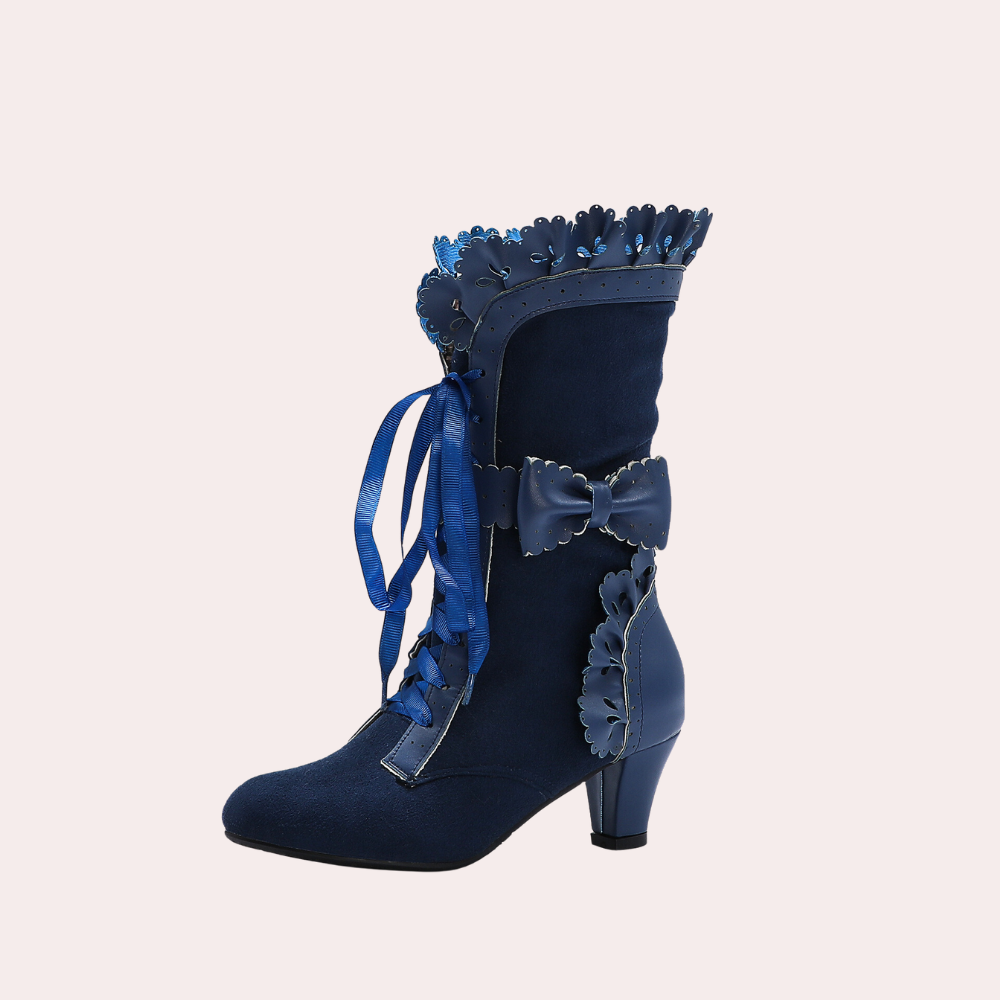 Blauwe dameslaars met hak, decoratieve strik en bloemenrand. Modieuze veterlaars voor herfst en winter. Perfect voor trendy outfits.