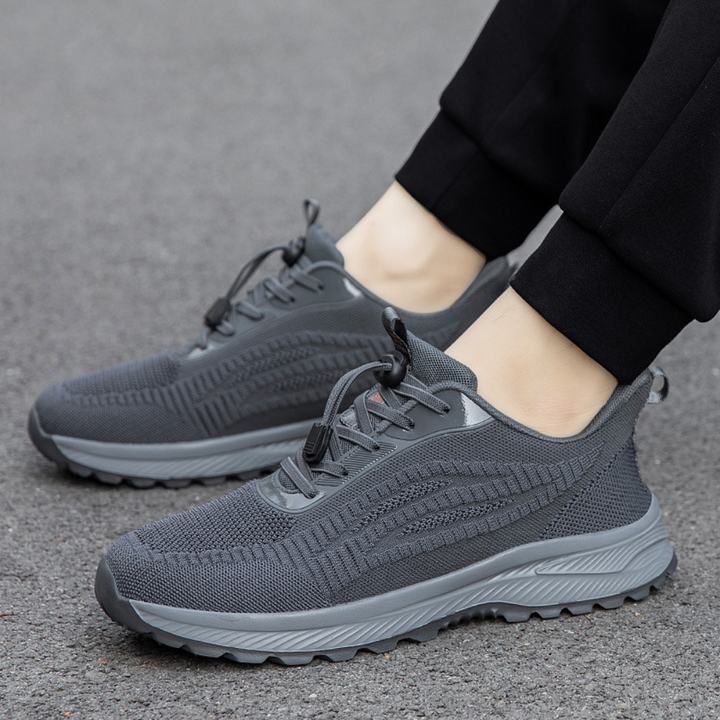 Grijze sportschoenen voor dames, ademend mesh, comfortabele zool, ideaal voor hardlopen en wandelen. Stijlvolle en duurzame sneakers.