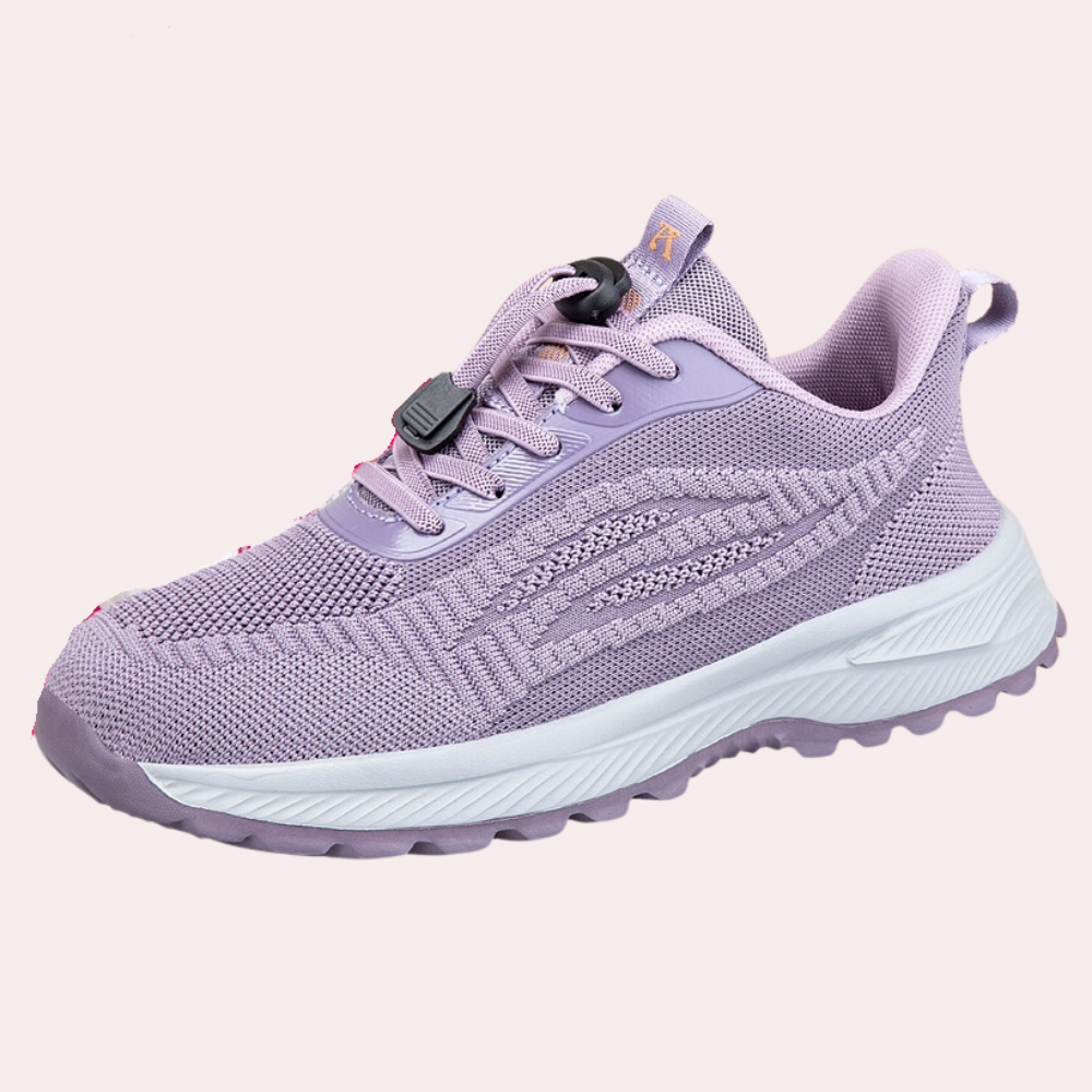Lichtpaarse sportschoen met ademend mesh, stevige zool en vetersluiting. Ideaal voor hardlopen en wandelen. Comfortabele en modieuze sneaker.