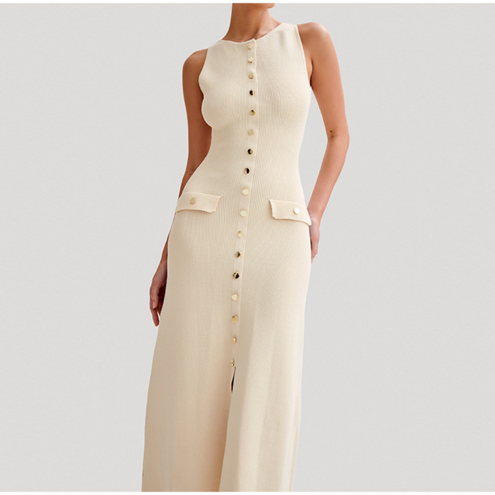 Mouwloze beige maxi-jurk met knoopsluiting en zakken, elegante damesmode, zomerjurk, casual chique stijl, perfect voor warme dagen.