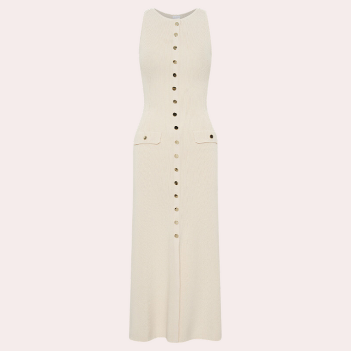 Elegante ivoorkleurige maxi-jurk met knoopsluiting, mouwloos ontwerp en zakdetails. Perfect voor zomerse gelegenheden en modieuze outfits.