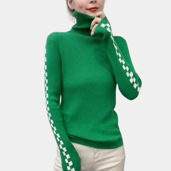 Groene coltrui dames, gebreid met witte ruitdetails op mouwen, modieuze winterkleding, comfortabele pasvorm, trendy damesmode.