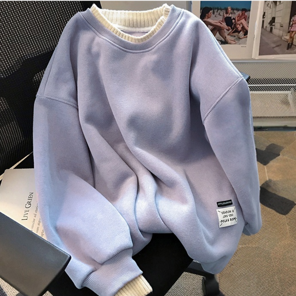 Lichtpaarse oversized trui met ronde hals en geribbelde boorden, casual mode, comfortabele dameskleding, trendy streetwear stijl.