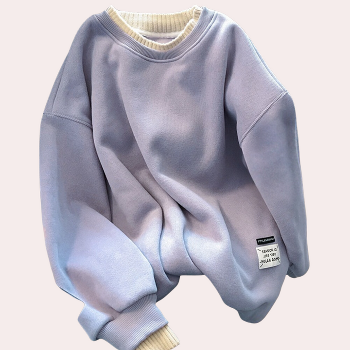 Lichtpaarse oversized sweatshirt met ronde hals en geribbelde boorden, casual stijl, uniseks, trendy streetwear, comfortabele katoenen stof.