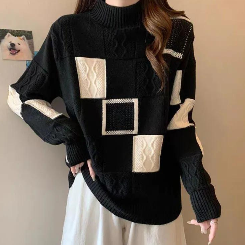 Zwarte gebreide trui met witte vierkante patronen, damesmode, herfst-winter kleding, stijlvolle casual outfit, comfortabele pasvorm.