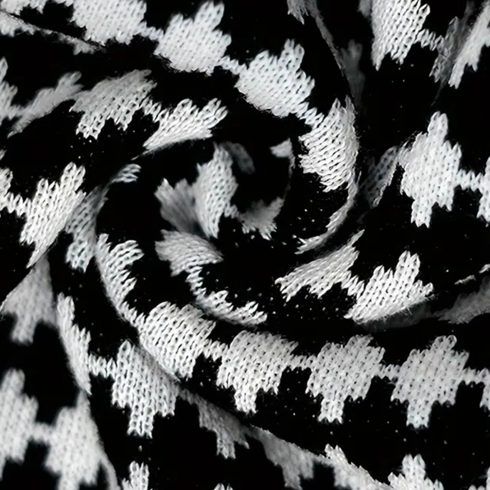Zwart-witte pied-de-poule stof close-up, gedetailleerd geweven patroon, textielontwerp, modetrend, hoogwaardige breisel textuur.