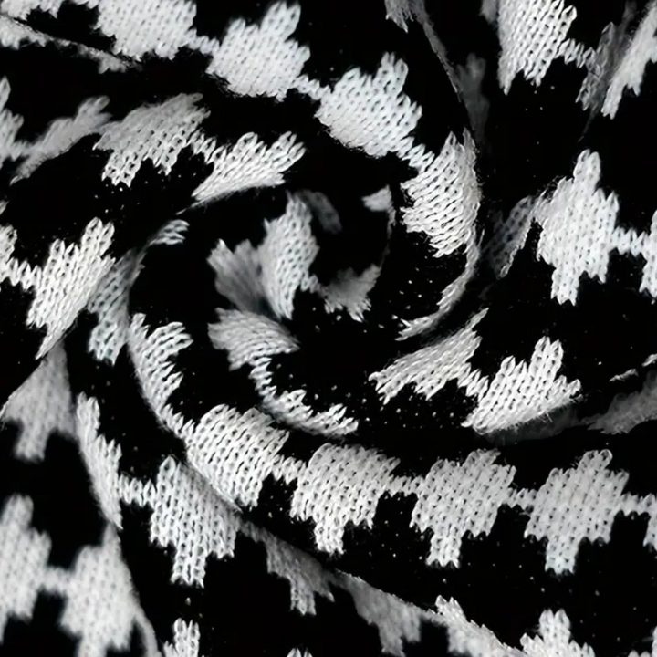 Zwart-witte pied-de-poule stof close-up, gedetailleerd geweven patroon, textielontwerp, modetrend, hoogwaardige breisel textuur.