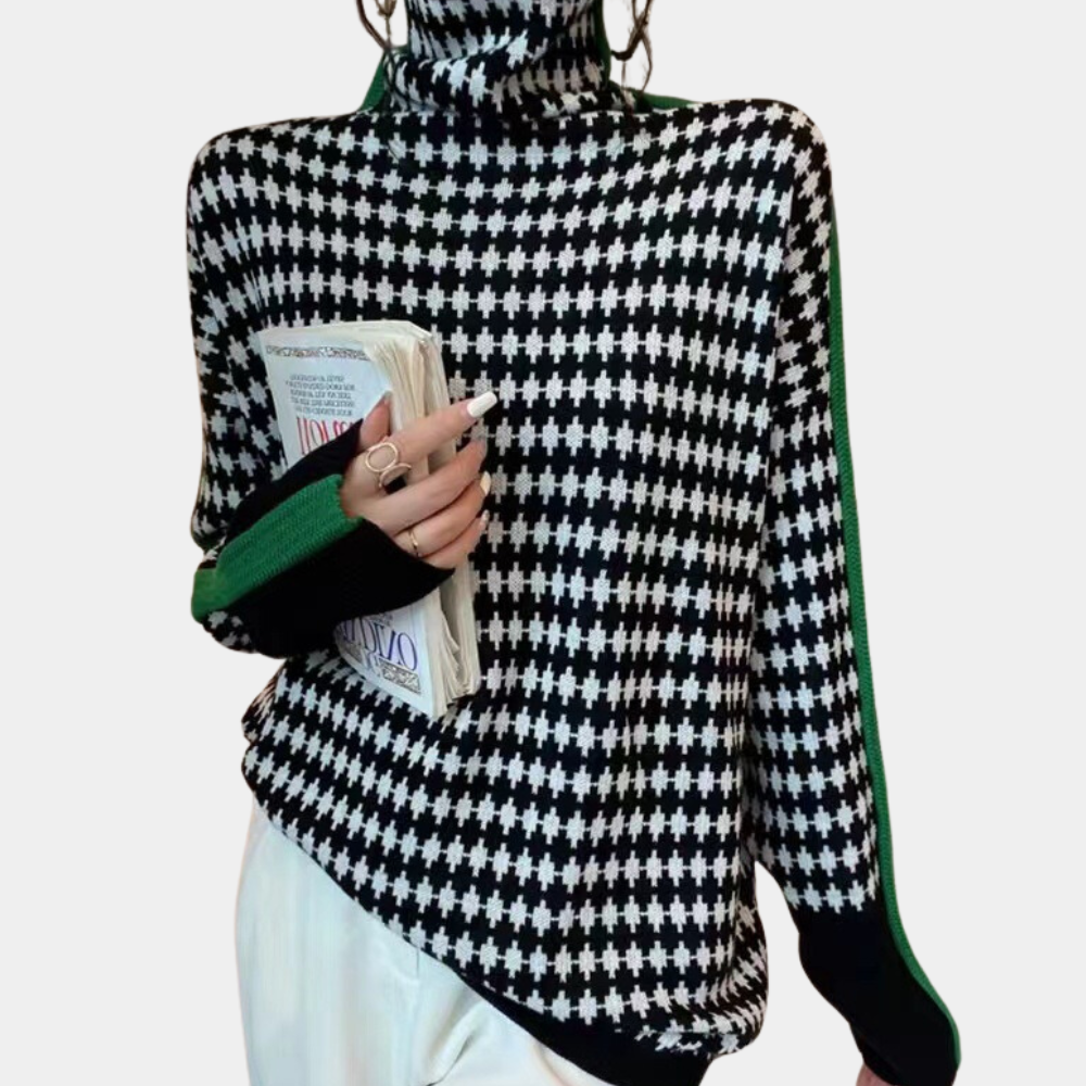 Damestrui met zwart-wit pied-de-poule patroon, groene strepen, coltrui, lange mouwen. Modieuze herfstkleding, trendy damesmode.