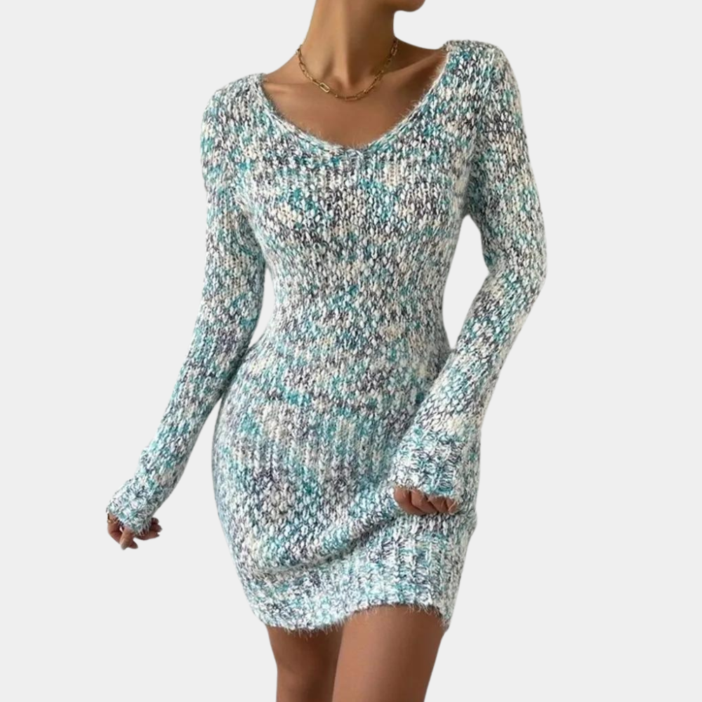 Groene gebreide damesjurk met lange mouwen, V-hals en gemêleerd patroon. Perfect voor herfstmode en casual outfits.