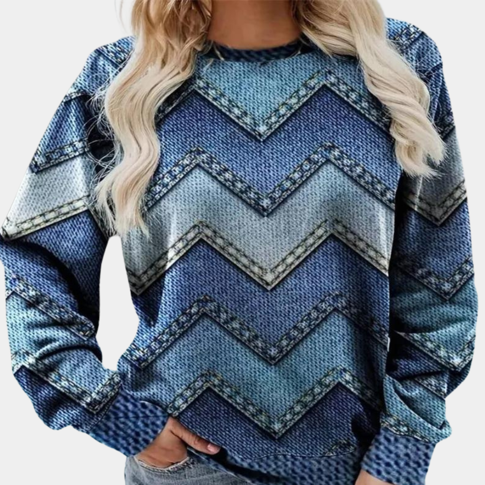 Blauwe damestrui met zigzagpatroon, denimlook. Modieuze casual kleding, ideaal voor herfst en winter. Comfortabele pasvorm, trendy design.