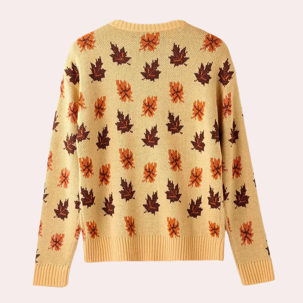 Gele trui met herfstbladeren patroon, gebreid design, lange mouwen, casual stijl, perfect voor herfstmode, dameskleding, comfortabele pasvorm.