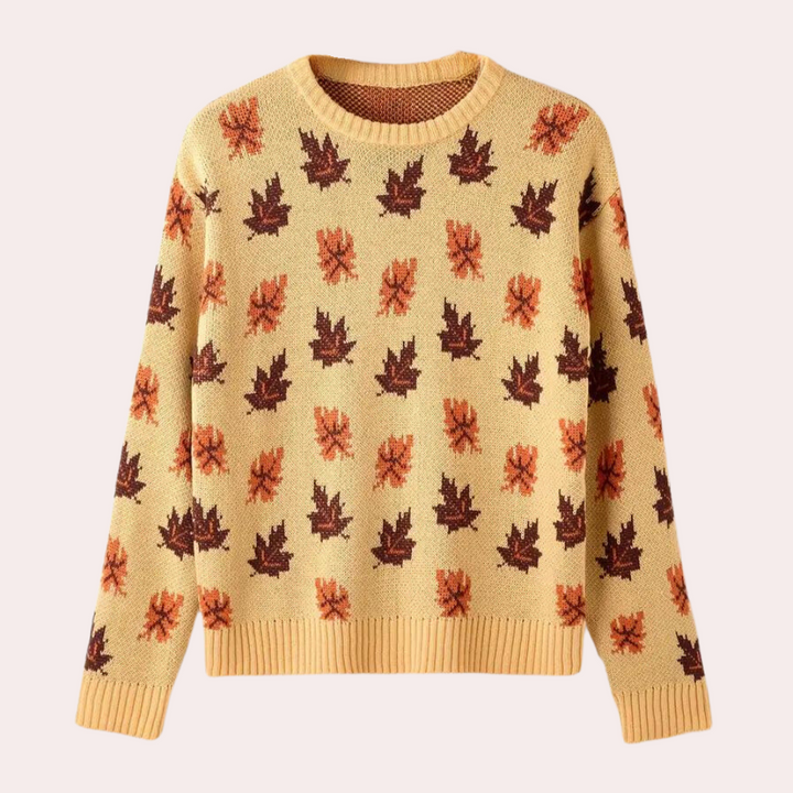 Khaki trui met herfstbladeren patroon, ronde hals en lange mouwen. Perfect voor herfstmode, warme en stijlvolle dameskleding.