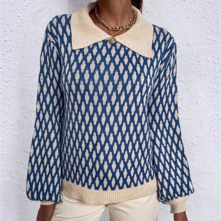 Damestrui met blauw-wit patroon, brede kraag en lange mouwen. Modieuze gebreide trui, perfect voor herfst- en wintermode.