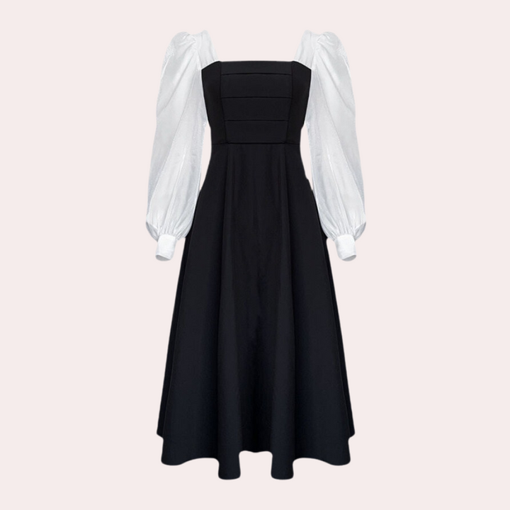 Zwart-witte jurk met lange pofmouwen en vierkante halslijn, elegante avondjurk, modieuze dameskleding, tijdloze stijl.