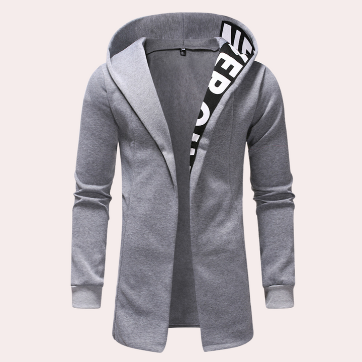 Grijze heren hoodie met capuchon, open voorkant en zwart-witte tekst op de binnenkant. Stijlvolle casual kleding voor mannen.