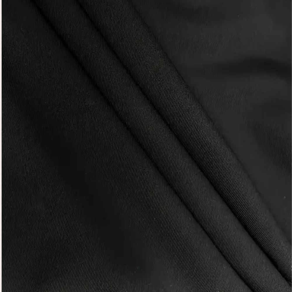 Zwarte stof close-up, gladde textuur, geschikt voor kleding en interieur. Hoogwaardige textielmaterialen, duurzaam en stijlvol design.