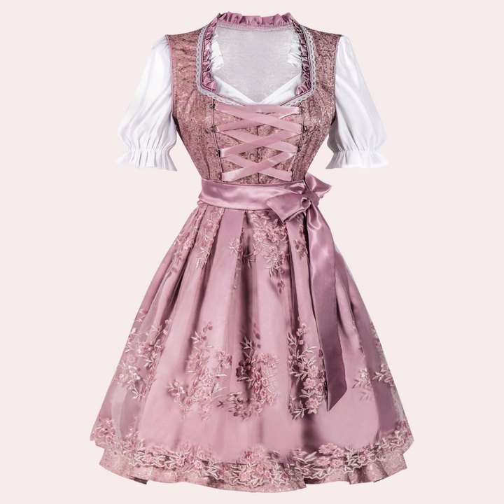Roze dirndl jurk met witte blouse, traditionele Beierse kleding, geborduurde bloemen, satijnen lint, Oktoberfest mode, elegante dameskleding.