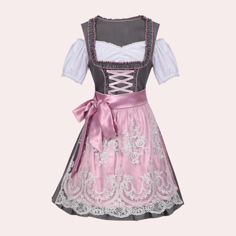 Roze en grijze dirndl jurk met witte blouse, satijnen strik en kantdetails. Traditionele Beierse kleding, perfect voor Oktoberfest.