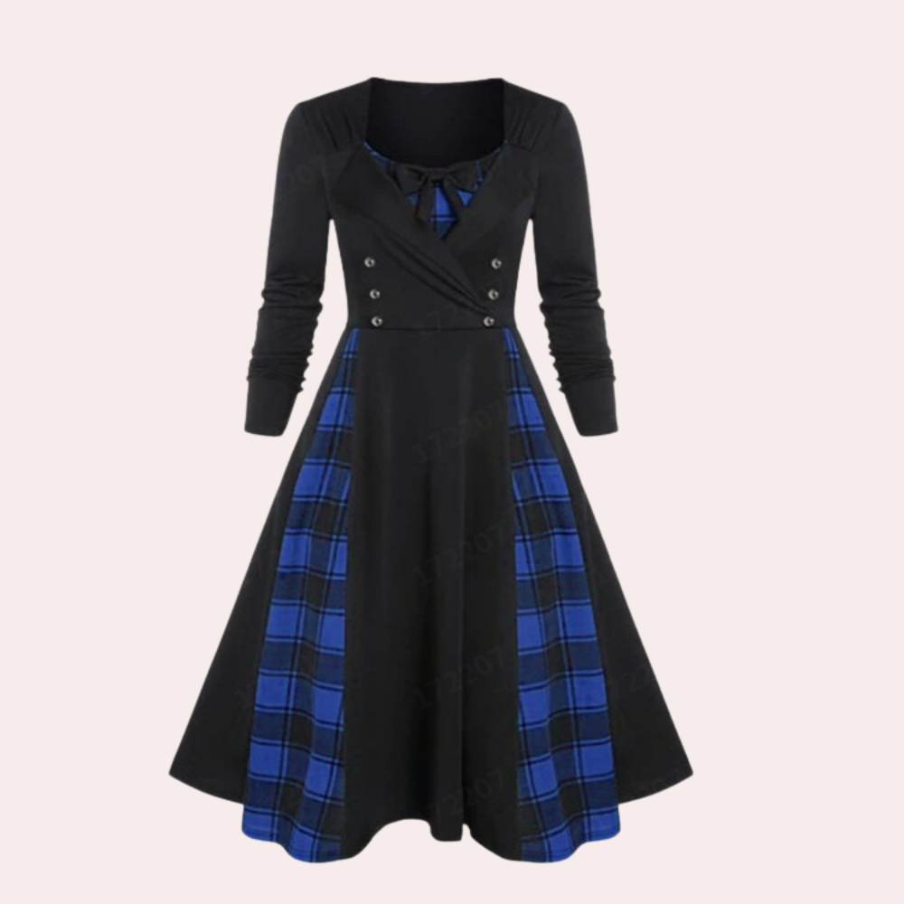Zwart-blauwe vintage jurk met ruitpatroon, lange mouwen en knoopdetails. Perfect voor retro mode en elegante dameskleding.