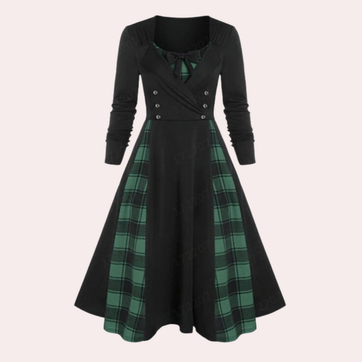 Groene geruite vintage jurk met lange mouwen en zwarte accenten, retro stijl, damesmode, elegante kleding, perfect voor herfst en winter.