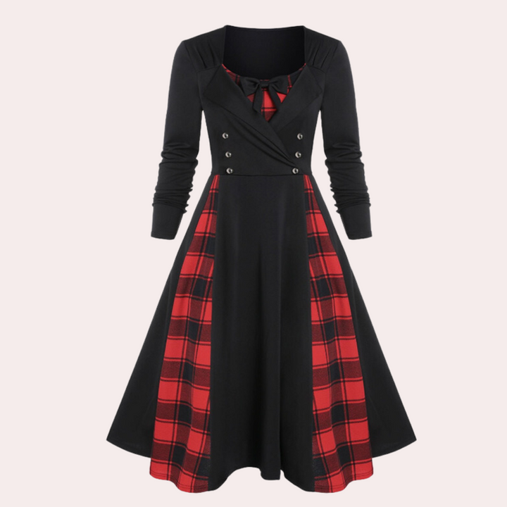 Zwart-rode vintage jurk met lange mouwen, dubbele knopenrij en geruite rok. Perfect voor retro mode en elegante dameskleding.