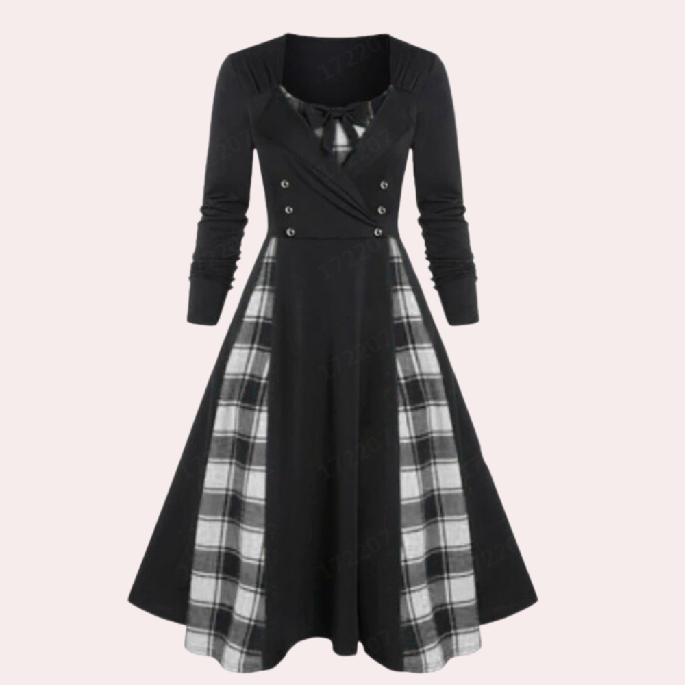 Zwart-wit geruite vintage jurk met lange mouwen en knoopdetails, elegante retro stijl, perfect voor herfstmode en casual chique outfits.