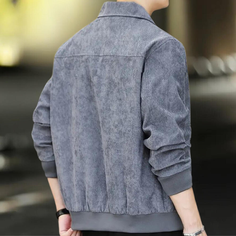 Grijze corduroy herenjas, lange mouwen, casual stijl, rugaanzicht. Perfect voor herfstmode, comfortabele pasvorm, trendy en veelzijdig.